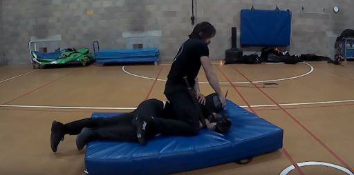 The Marshal of the Academy demonstrating unarmed grappling techniques.